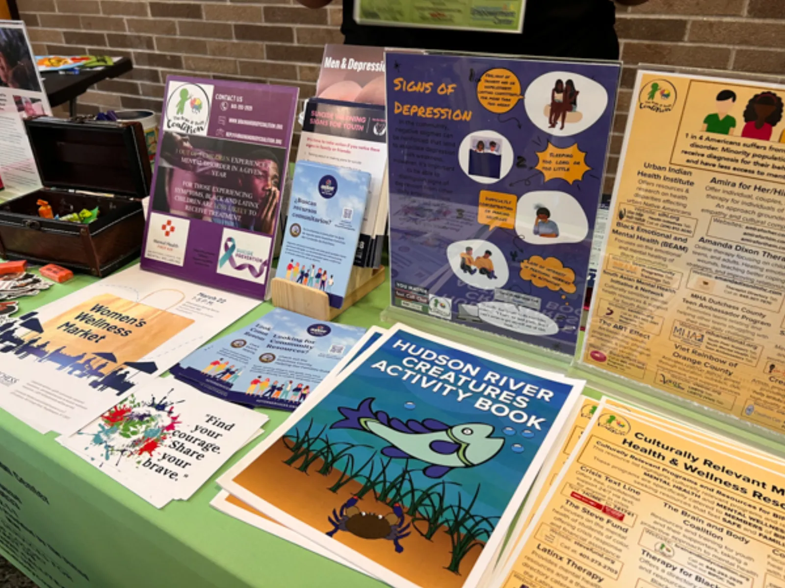 Children collaborating on arts and crafts at the Poughkeepsie community event