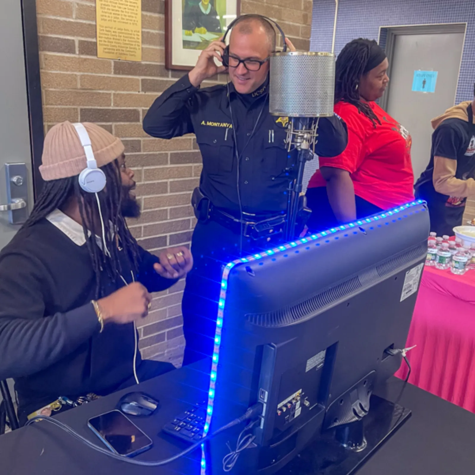 Group photo of community partners and volunteers at the Books and Breakfast event