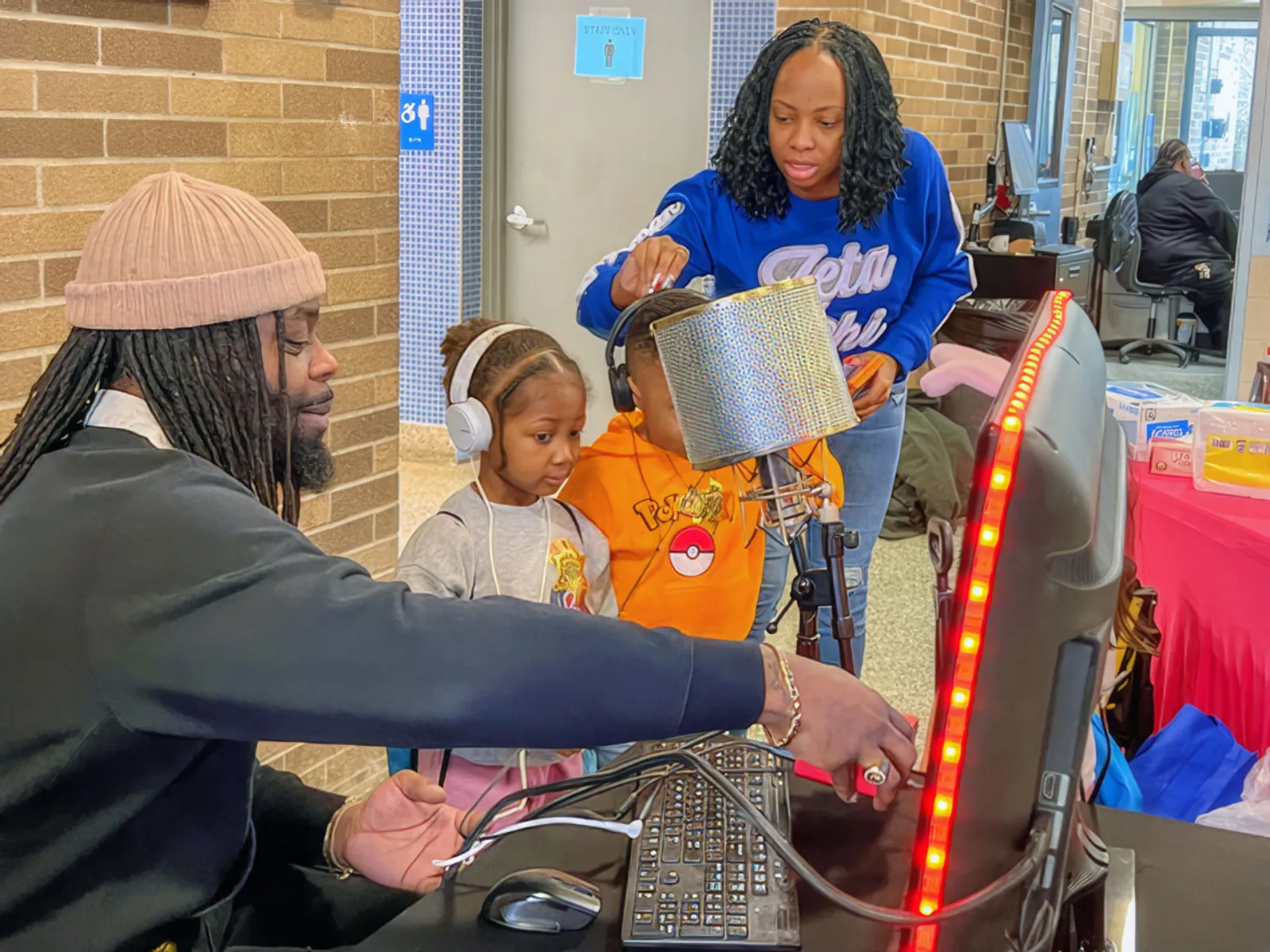 Children receiving books at the fourth annual Books and Breakfast event in Poughkeepsie